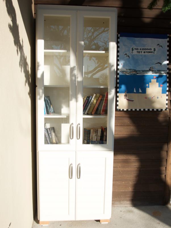 A tall cabinet is ready to be filled with books to borrow at the Ropewalk shopping plaza. BY GEORGIA SPARLING